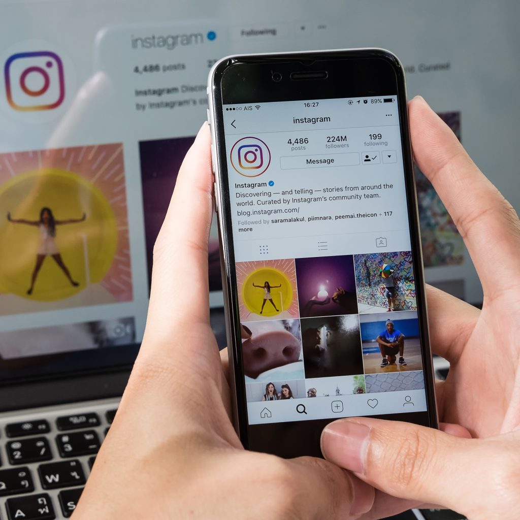 Instagram profile on phone and computer.