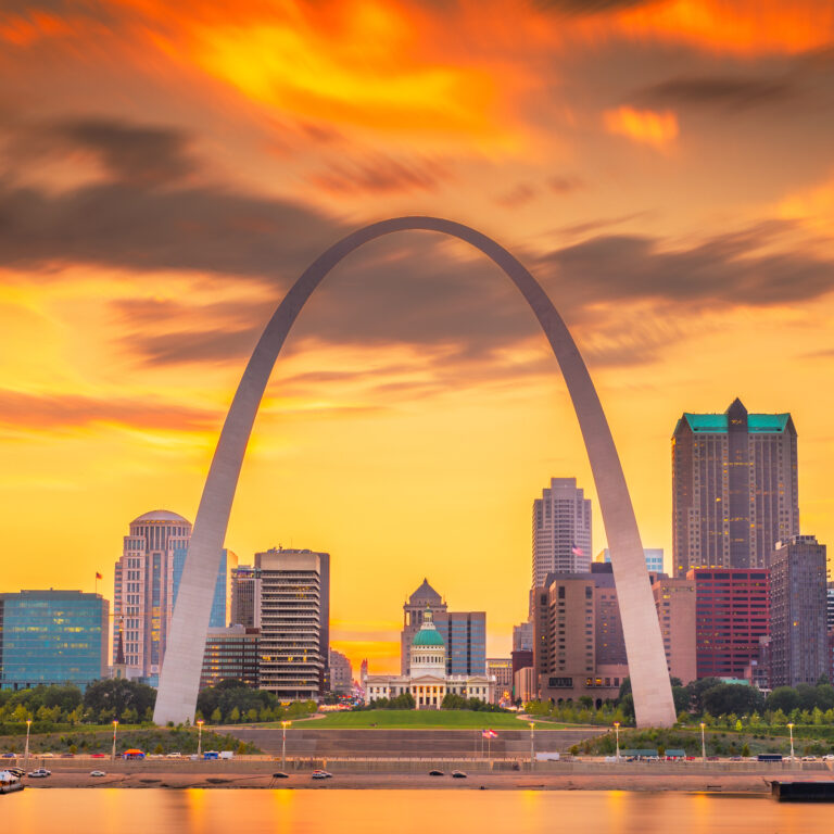 St. Louis, Missouri, USA downtown cityscape on the Mississippi River at twilight.